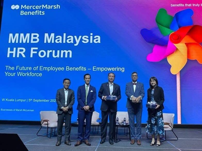 Photo 2 of 2: In a panel with Tan Sri Datuk Dr Noor Hisham Abdullah and with Ms Tung Hsiao Ley, Chief Corporate…