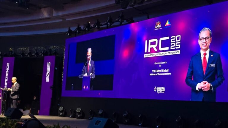 Photo 2 of 3: At the International regulatory conference organised by MCMC.