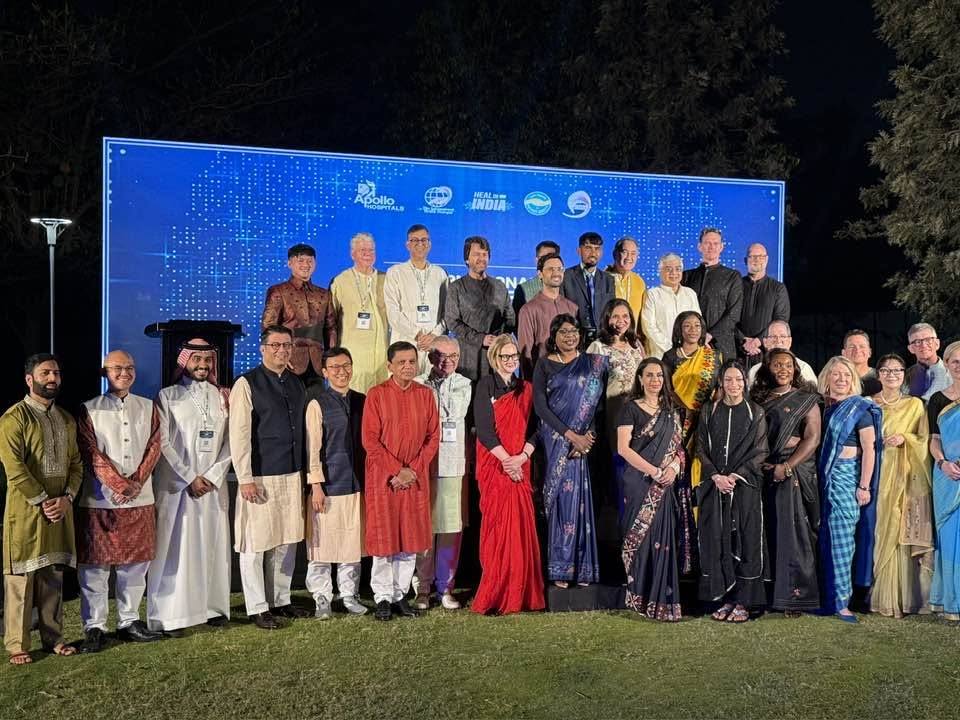 Photo 1 of 1: All International speakers dressed in the Indian Traditional attire for a photograph with Dr Sangita…
